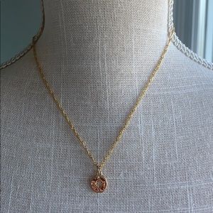 Gold compass necklace